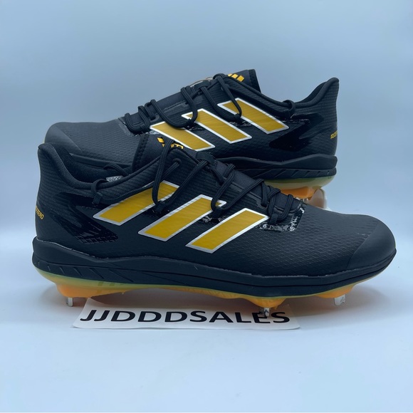 black and yellow baseball cleats